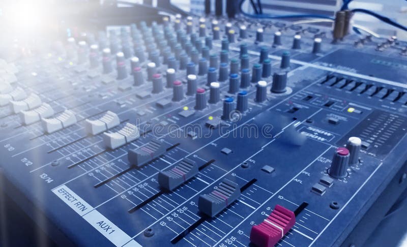 Professional audio Mixer and Professional Headphones in the Recording Studio. Sound Mixing Desk. Sound Mastering For Radio and TV