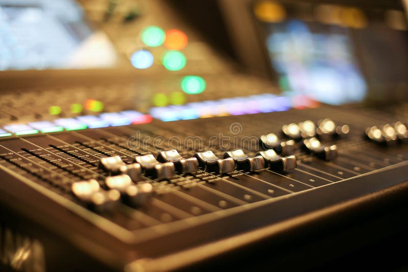 Professional audio mixing console with faders and adjusting knob stock photos Professional audio mixing console with faders and adjusting knob stock photos