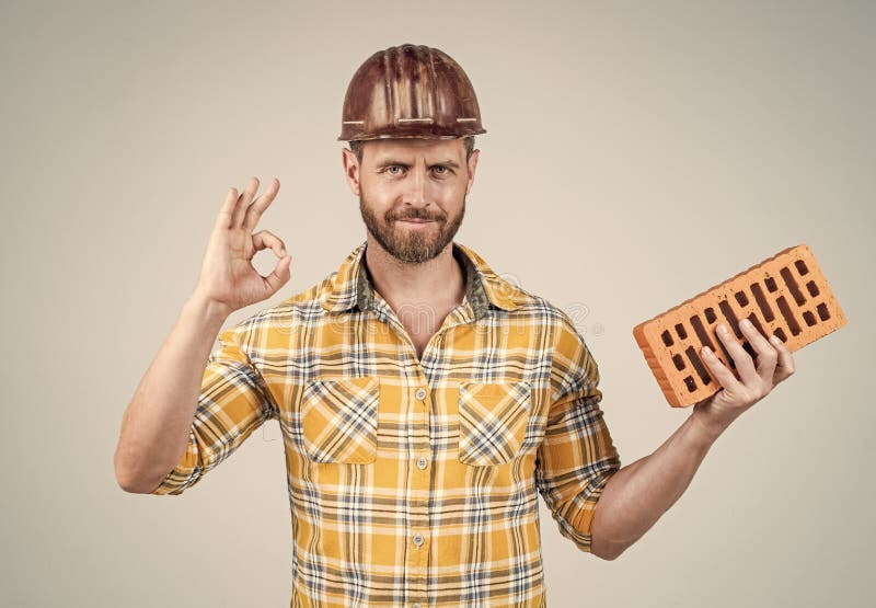 Professional Bricklayer Show Ok Gesture. Builder Engineer. Labor or