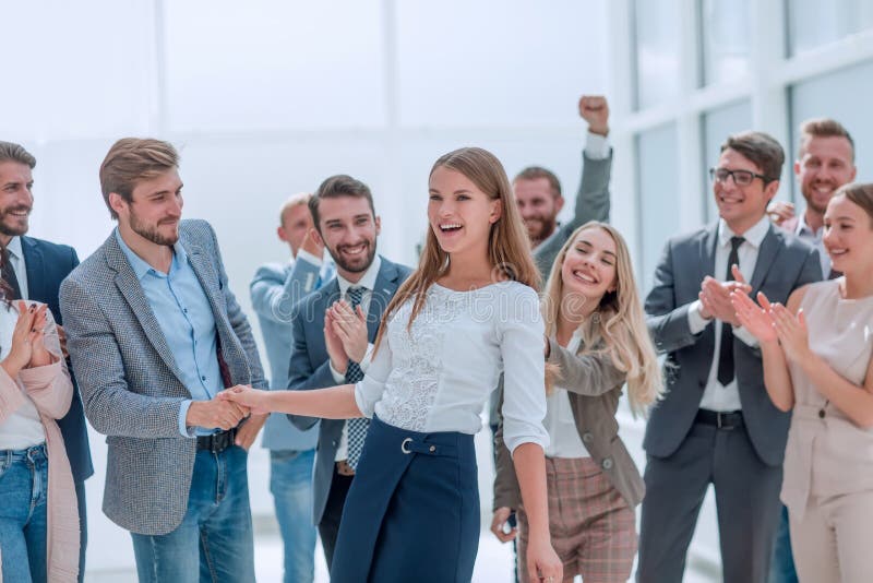 Professional business team congratulating their leader. photo with space for text stock photos Professional business team congratulating their leader. photo with space for text stock photos