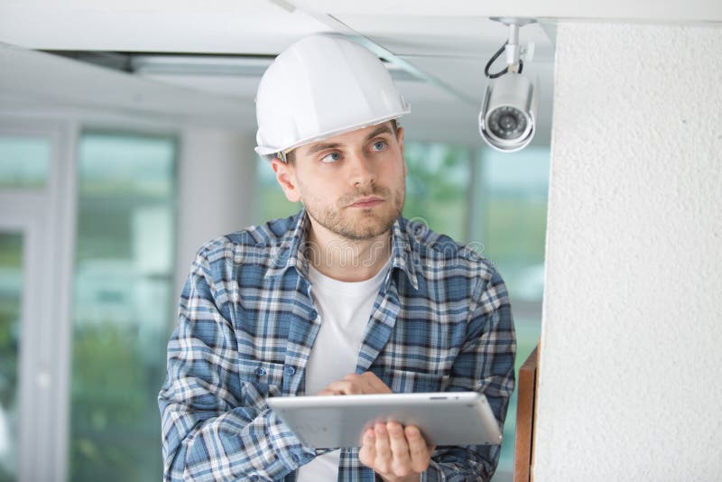 CCTV technician on call stock photo. Image of circuit 119528760