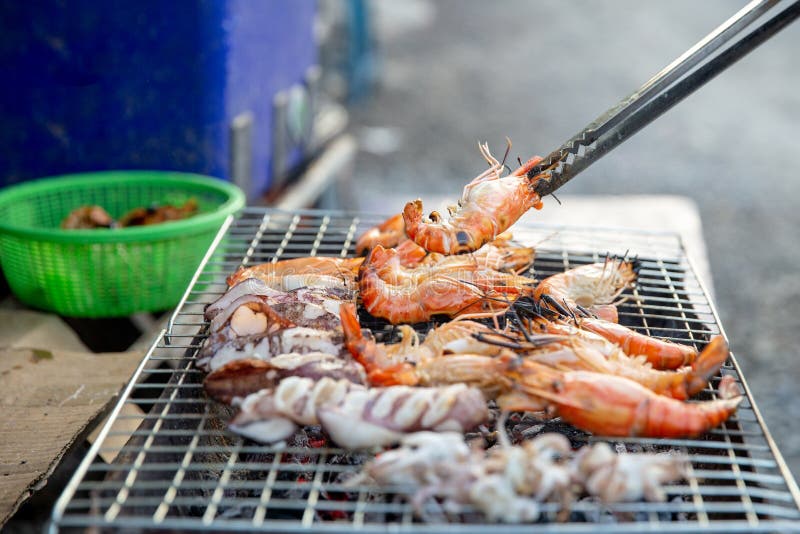 Professional Chef Cooking Prawns or Shrimp Grilled on Charcoal Stove ...