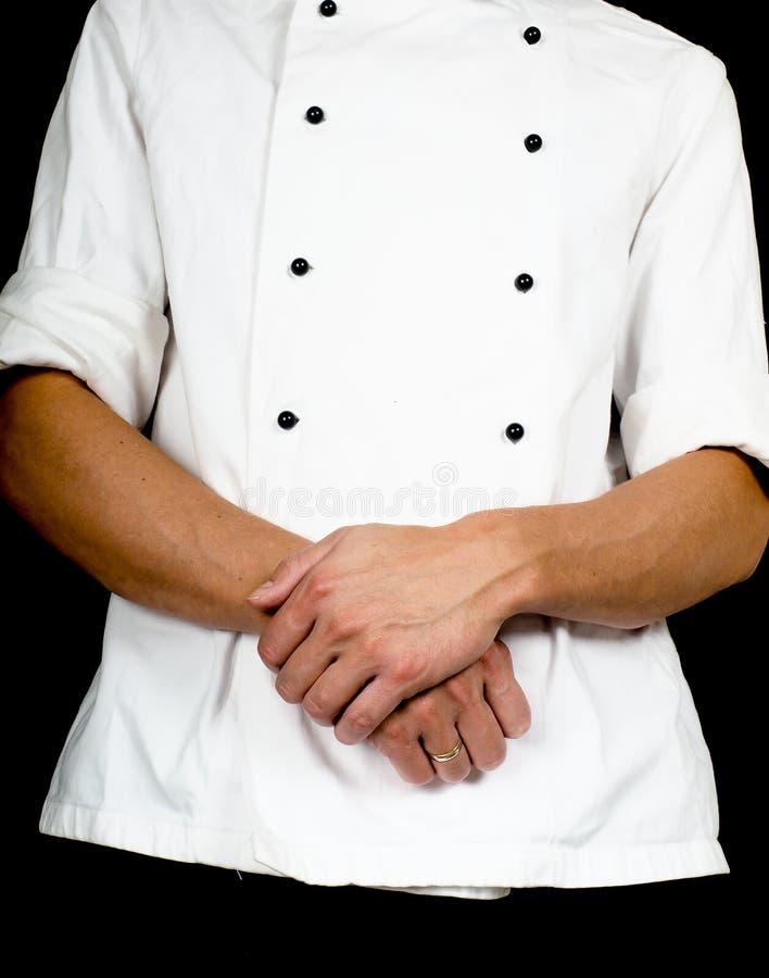 Professional Chef with a Hand Gesture Towards, Wearing a Chefs J Stock