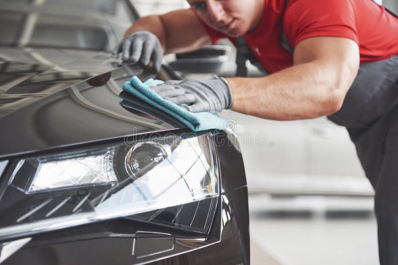 Professional Cleaning and Car Wash in the Car Showroom Stock Photo