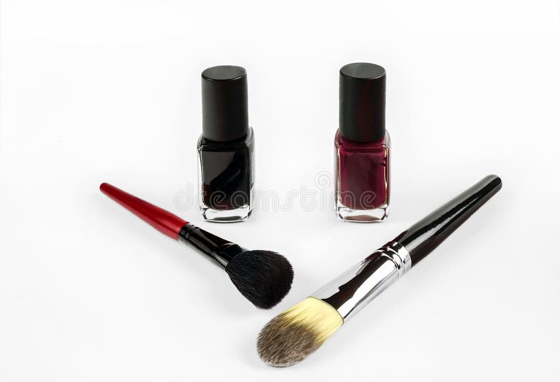 Professional Cosmetics Nail Polish and Makeup Brushes Stock Photo