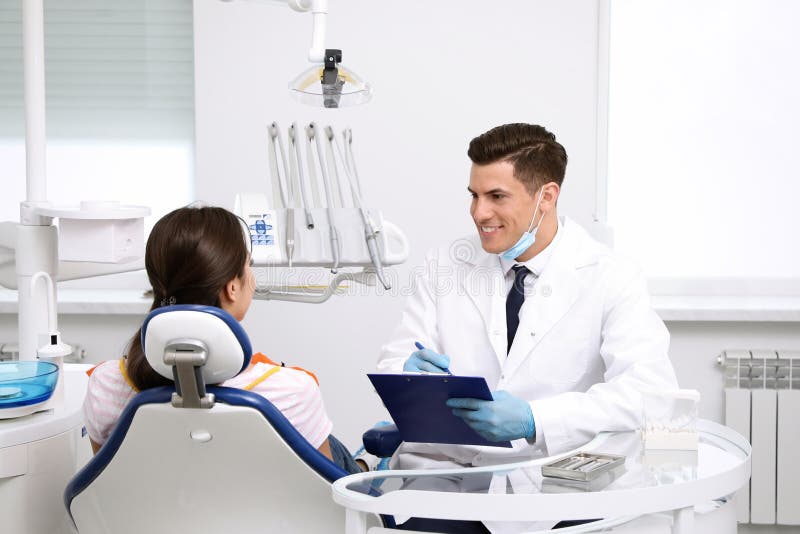 Professional Dentist Working with Patient Stock Photo Image of