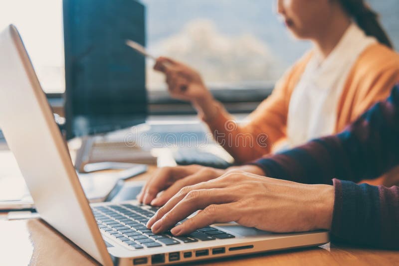 Professional Development programmer cooperating meeting and brainstorming and programming website working in a software and coding stock photo