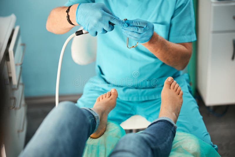 Podiatrist Holding Child Leg In Massage Parlor Closeup Stock Photo