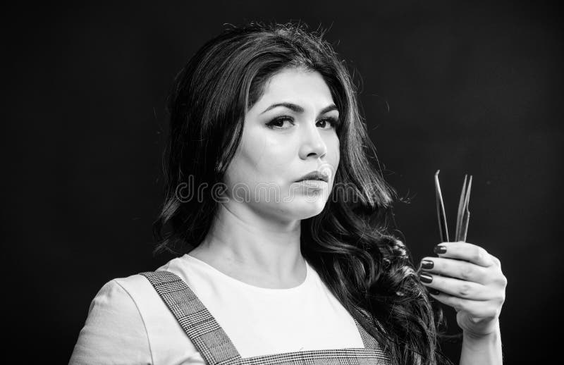 Professional eyelash extension tweezer. Makeup artist. Cosmetic tweezer. Girl makeup face hold tweezer for eyelash stock image Professional eyelash extension tweezer. Makeup artist. Cosmetic tweezer. Girl makeup face hold tweezer for eyelash stock image