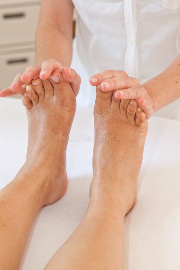 Professional feet massage stock image. Image of rejuvenate 26500679