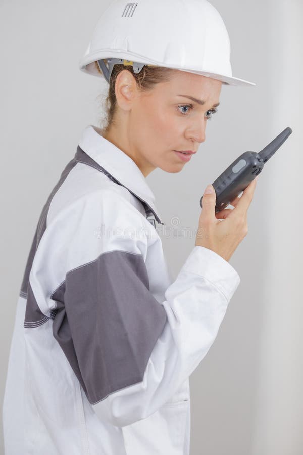 Professional Foreman with Radio at Construction Site Stock Image