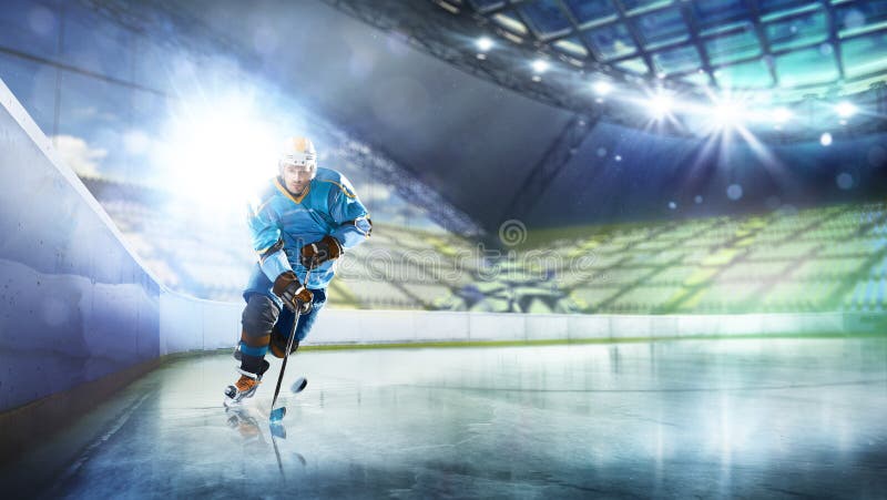 Professional hockey player in action on grand arena royalty free stock photography