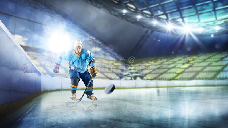 Professional hockey player in action on grand arena stock photography
