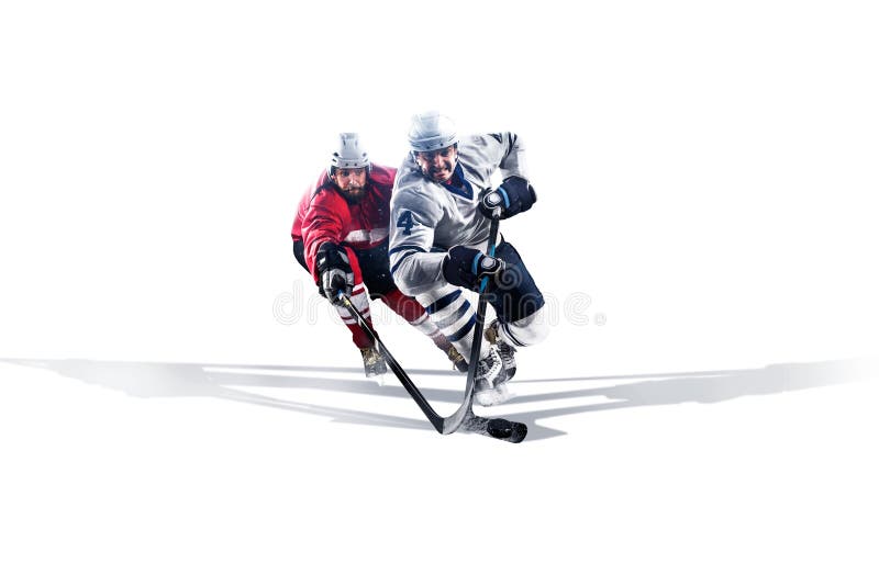 Professional hockey player skating on ice. Isolated in white stock photos