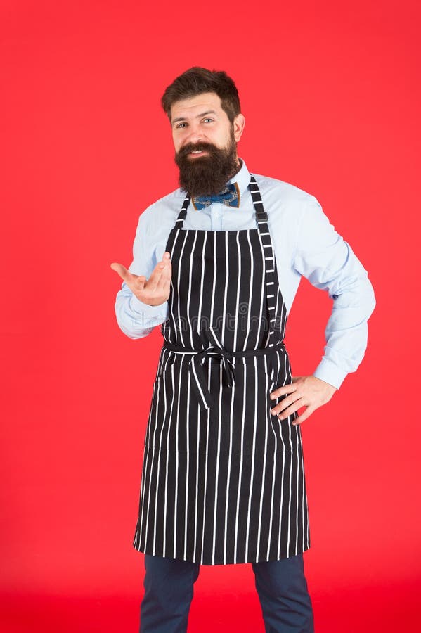 Professional In Kitchen Man With Beard Cook Hipster Apron Hipster Chef Cook Red Background 