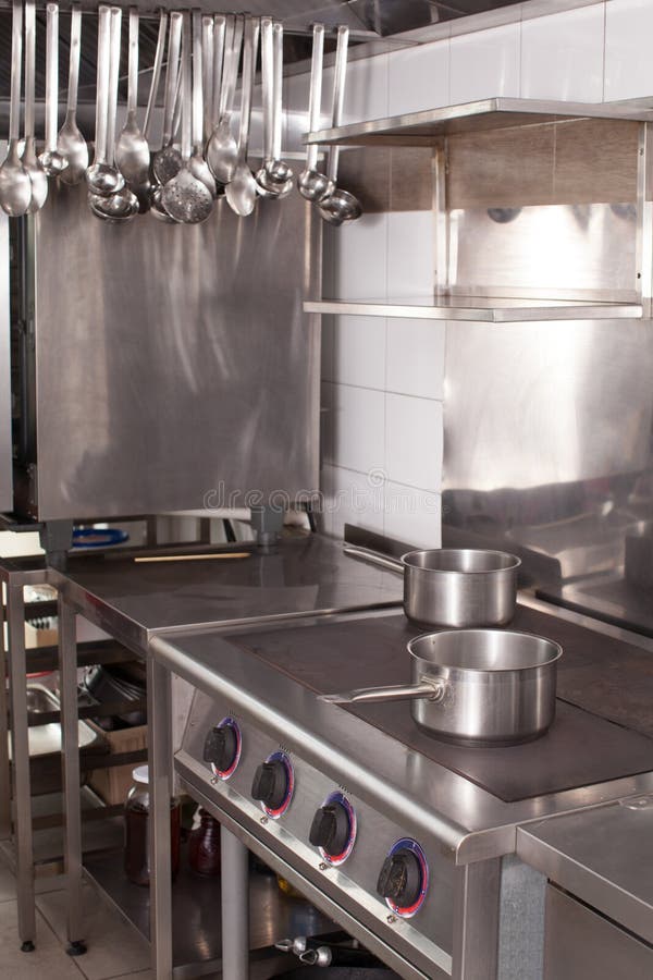Cooking In A Professional Restaurant Kitchen On The Stove With F Stock