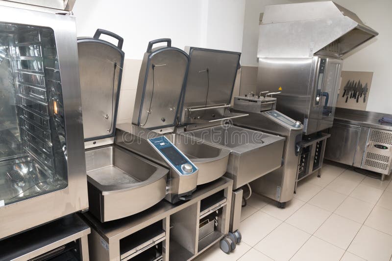 Professional kitchen steel equipment for food preparing stock image