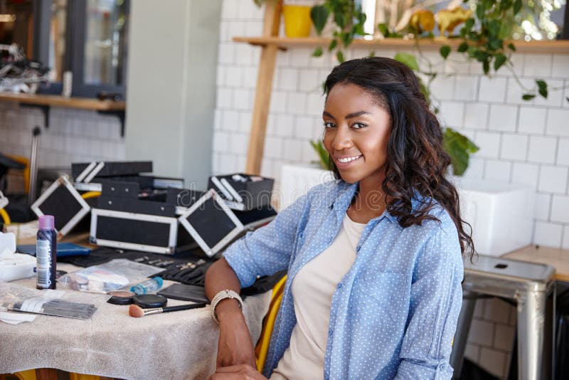Professional Makeup Artist at Work. a Young Makeup Artist at Work