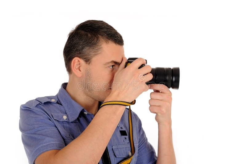 Professional male photographer taking picture