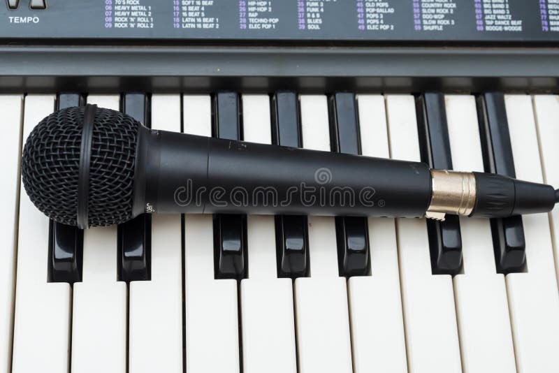Professional Microphone on the Keys of a Piano Stock Image Image of
