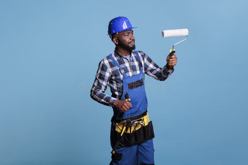 Professional Painter Painting Walls with Roller Stock Image Image of