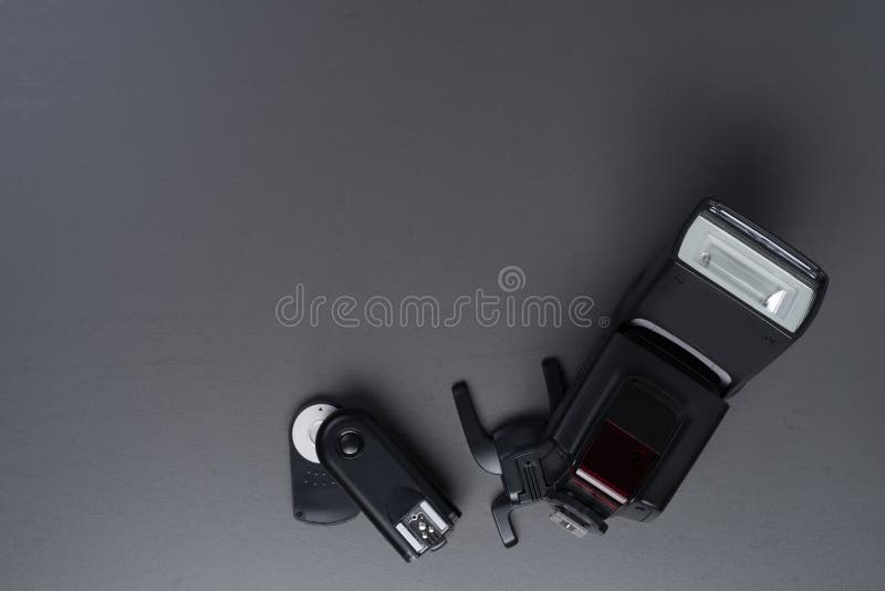 Professional Photo Camera Flash Light Isolated on Grey Stock Image