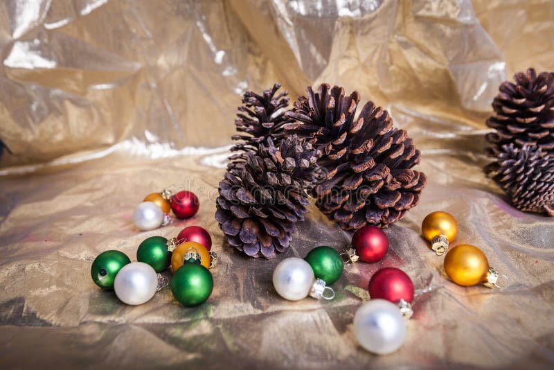 Holiday Christmas scene pine cones and ornaments winter background