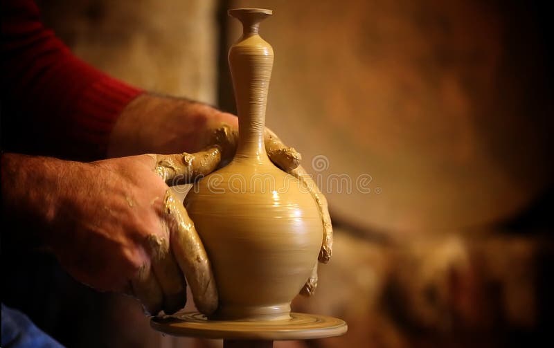 Professional potter making bowl in pottery workshop