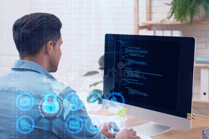Professional programmer working with computer stock photos