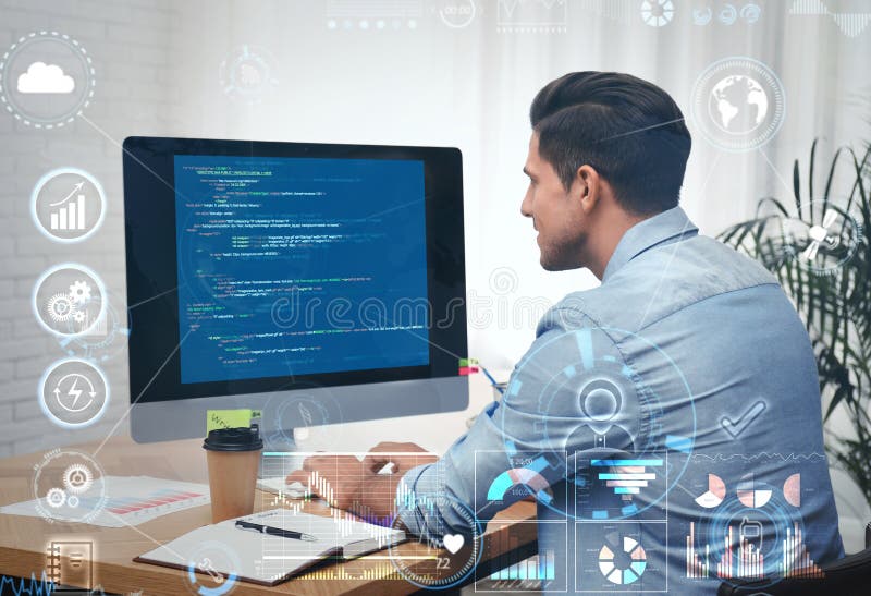 Professional programmer working with computer stock images