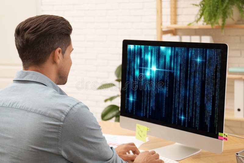 Programmer working with computer in office royalty free stock photos