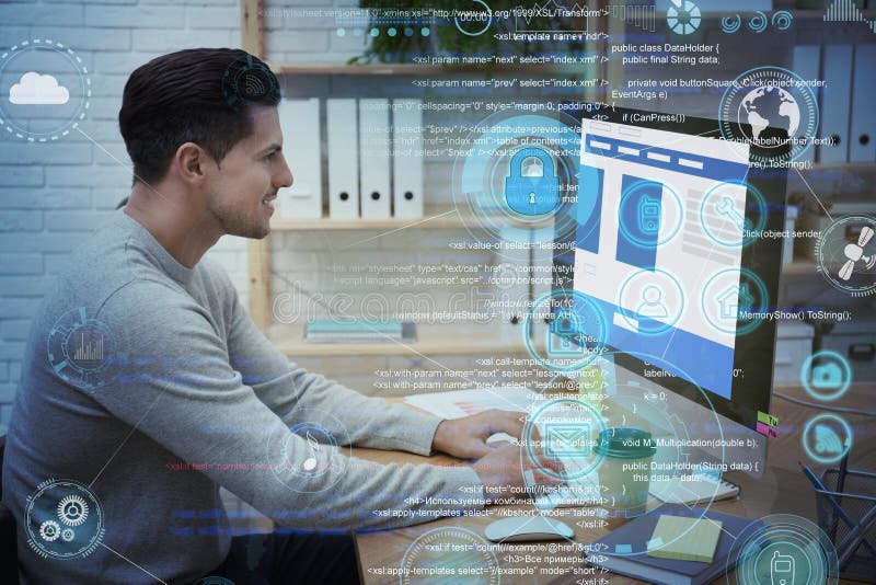 Programmer working with computer in office stock photography