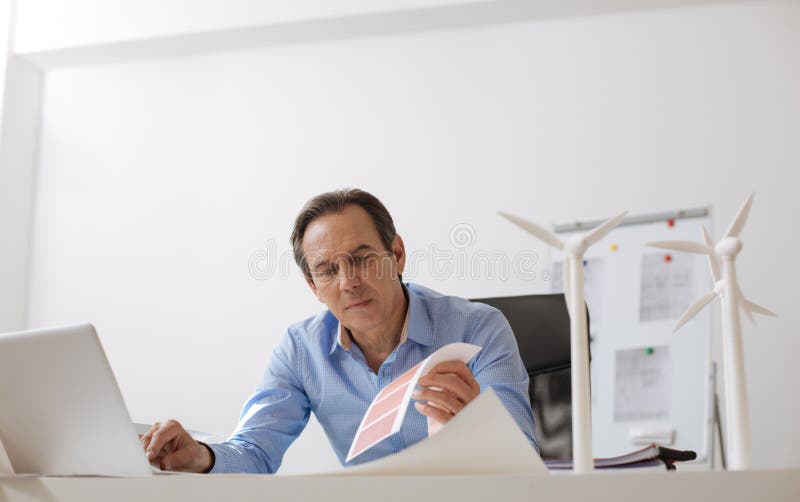 Professional Senior Engineer Sitting in the Office Stock Photo - Image ...