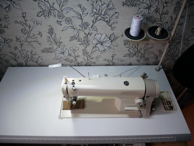 Professional Sewing Machine at Home. Sewing Machine for Work Stock