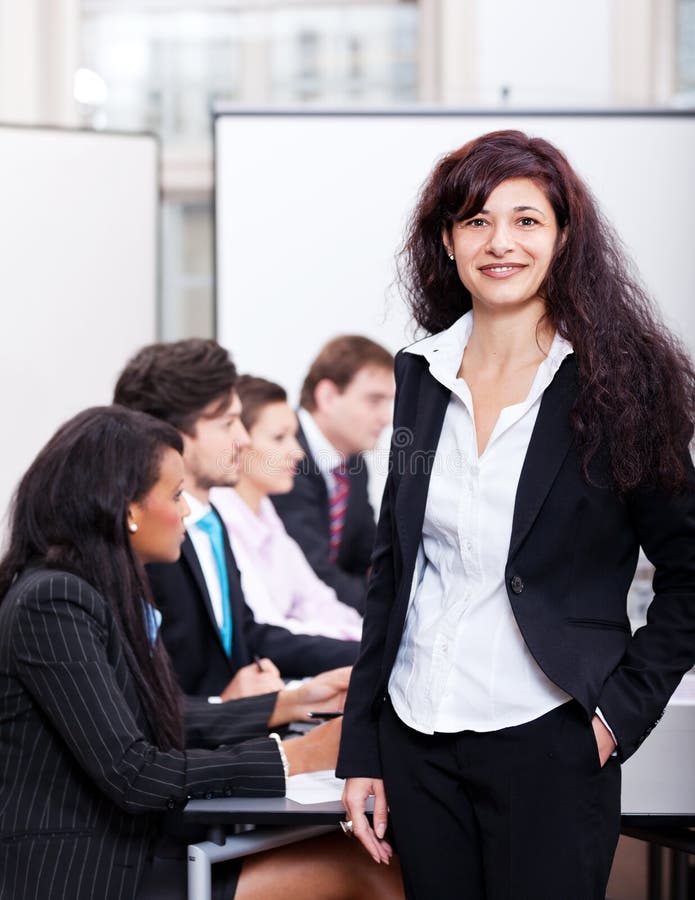 Professional successful business woman in office smiling royalty free stock photos Professional successful business woman in office smiling royalty free stock photos
