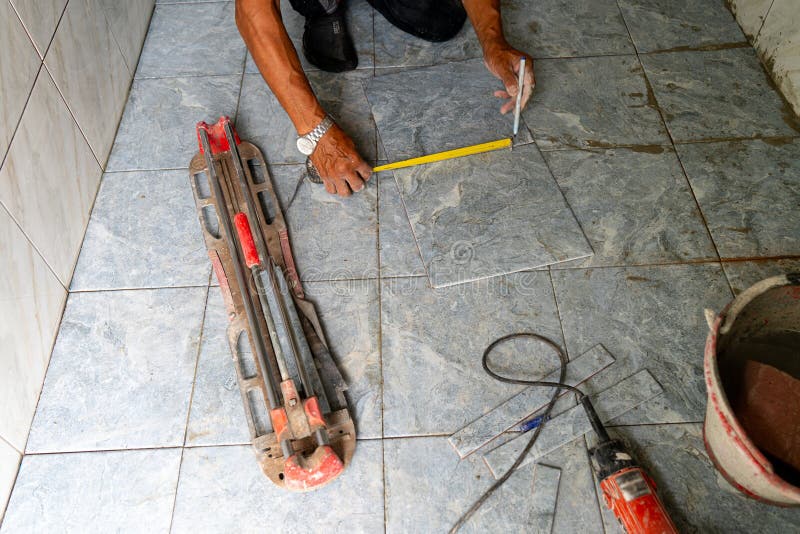 Professional Thai Builder, Tiler, Laying Ceramic Tiles on Walls, Bathrooms Stock Image Image