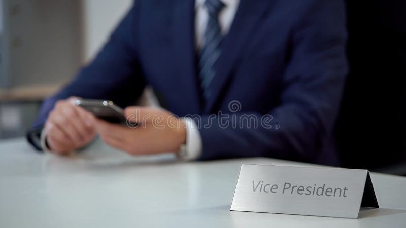 Professional vice president of company using smartphone for communication stock photos Professional vice president of company using smartphone for communication stock photos