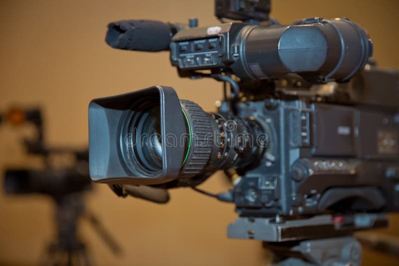 Professional Video Camera Set on a Tripod with Excellent Clipping Path