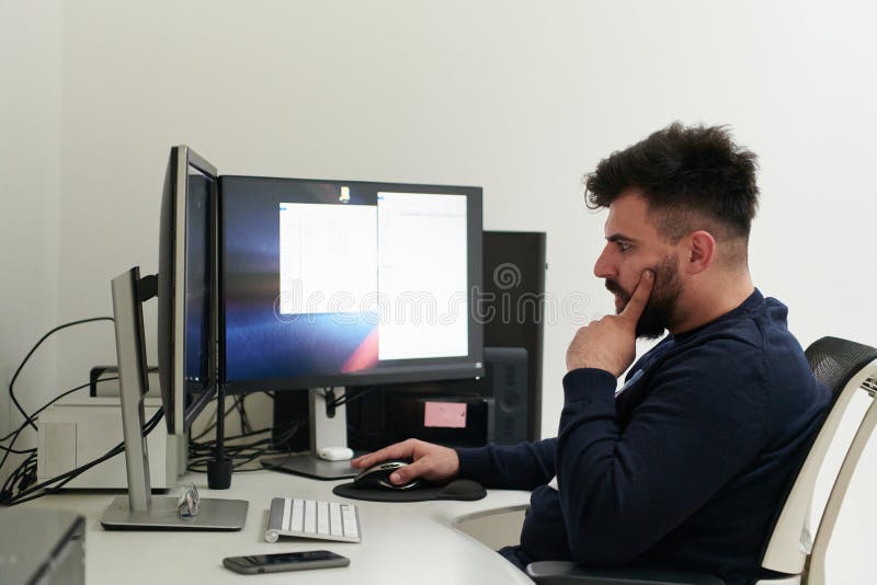 Professional video editor enhancing digital footage using specialized software royalty free stock photo
