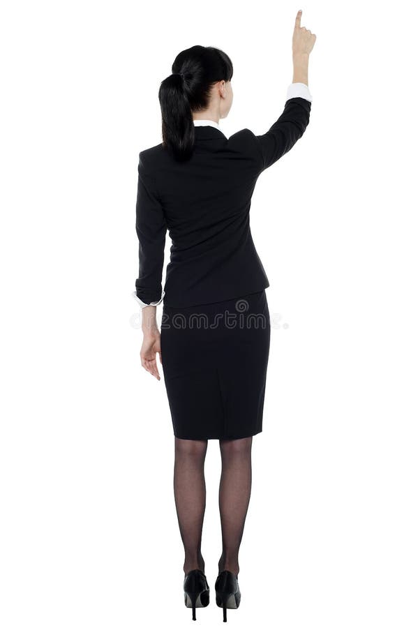 Professionele collectieve dame die op exemplaarruimte richt royalty-vrije stock fotografie Professionele collectieve dame die op exemplaarruimte richt royalty-vrije stock fotografie