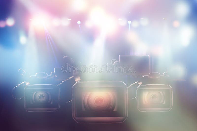 Drie professionele videocamera's in de studio stock foto's