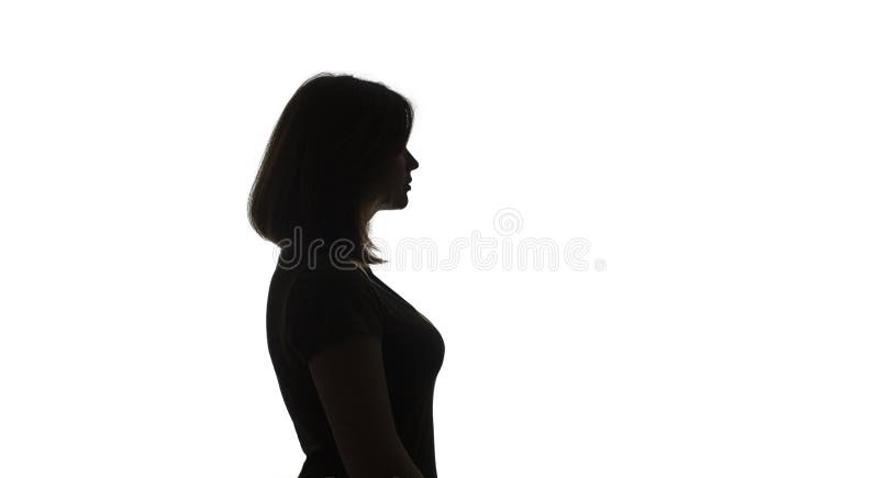 Profil för unga kvinnor som befinner sig i en svår situation och som fattar beslut om isolerad bakgrund royaltyfria bilder