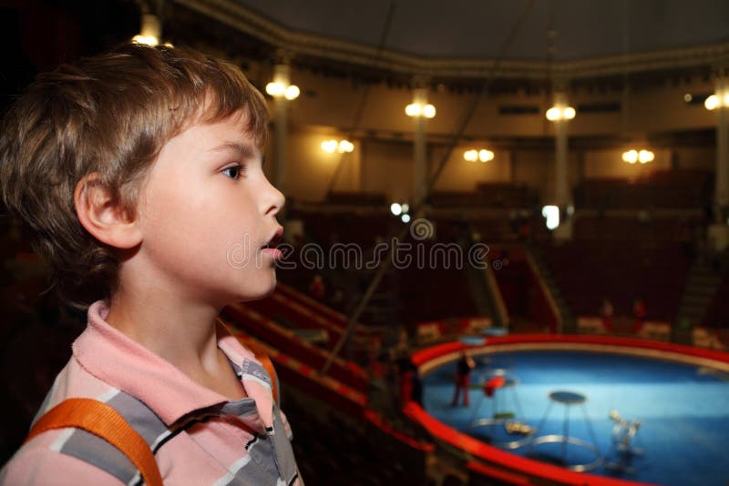 Profile of boy in circus looking at side royalty free stock photo