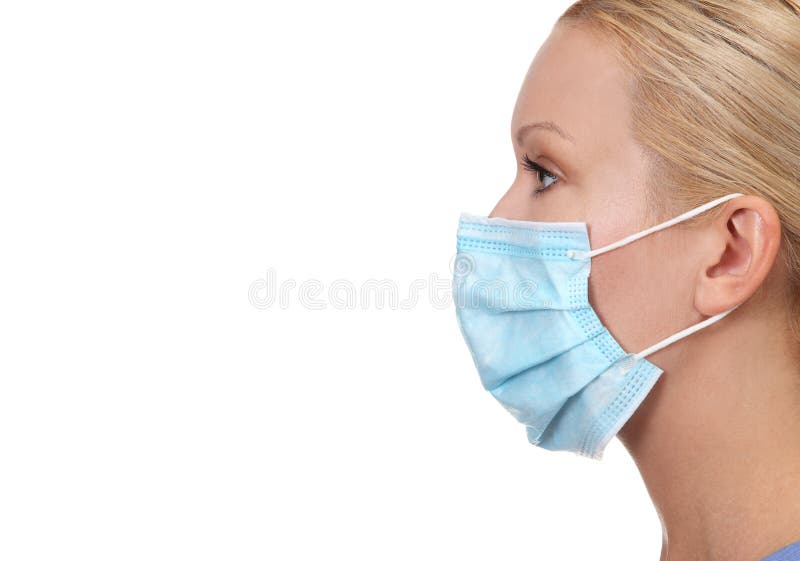 Profile image of young female nurse wearing face mask isolated on white. Side profile mask stock images, royalty-free photos and pictures