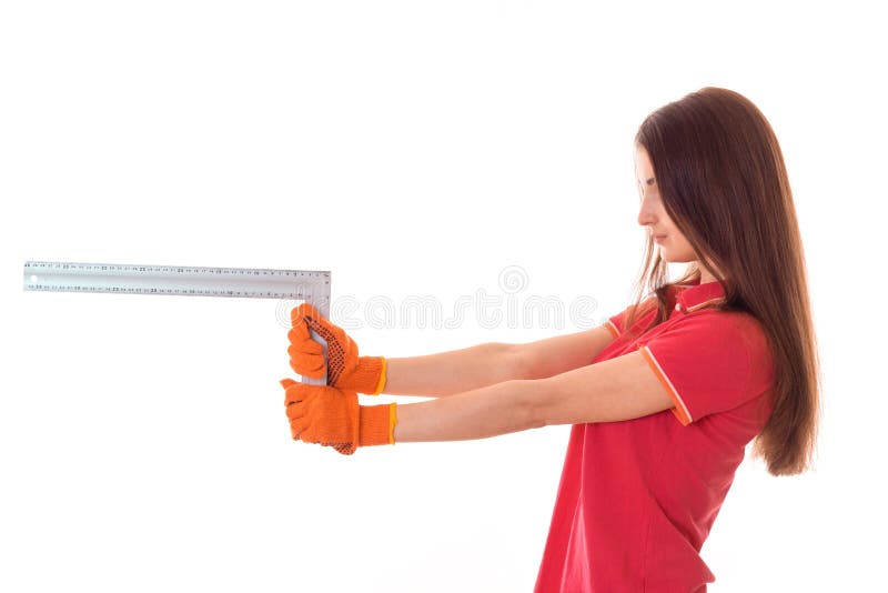 Profile portrait of beauty brunette lady builder makes renovation isolated on white background stock photography Profile portrait of beauty brunette lady builder makes renovation isolated on white background stock photography