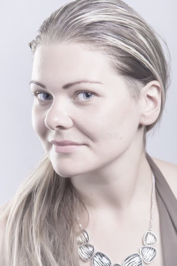 Profile portrait of pretty blond woman