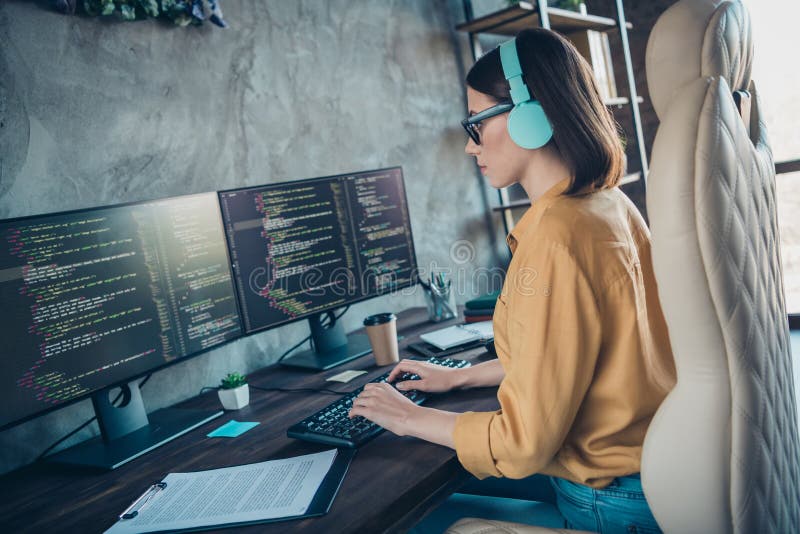 Profile portrait of serious smart web designer sitting chair keyboard write edit database workplace inside stock image