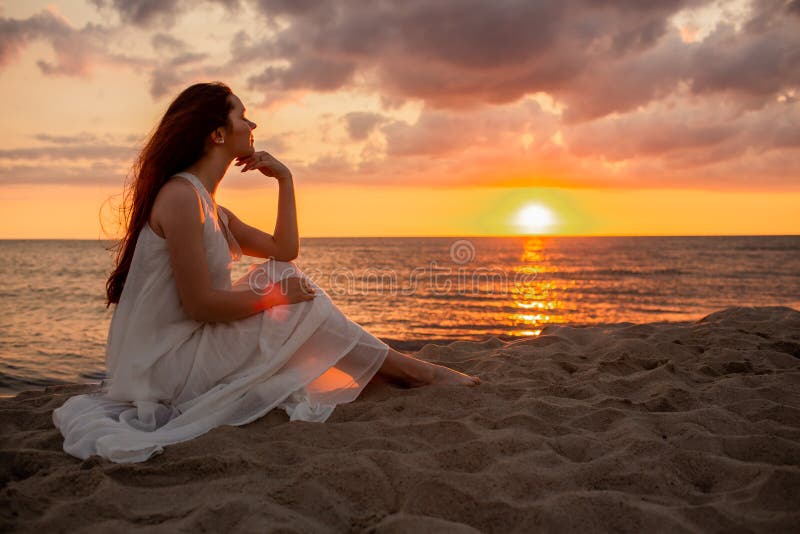 Profile of a Sad Young Woman Silhouette in Swimsuit Stock Image