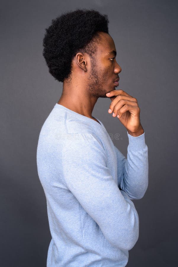 Profile View Of Young Handsome African Man Thinking Stock Image - Image ...