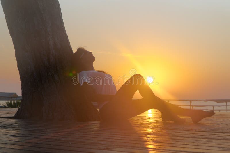 Profile of a Sad Young Woman Silhouette in Swimsuit Stock Image